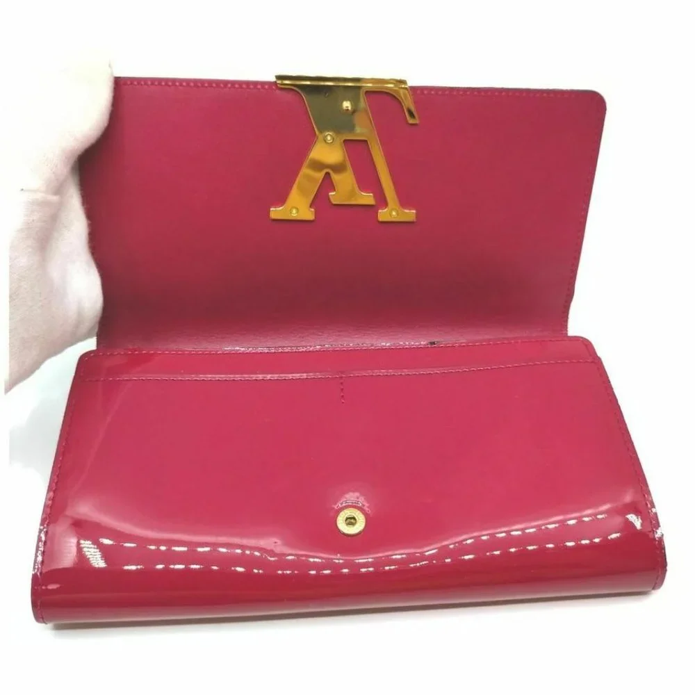 Louis Vuitton Louis Vuitton Indian Rose Portefeuil